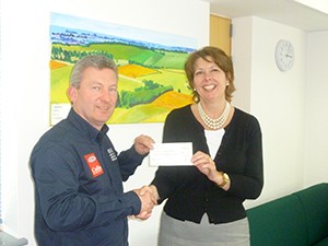 Jon Horsley from Cadley Garage presented a cheque for £1,000 to Mrs Nicky Edmondson, Principal of St John's Marlborough
